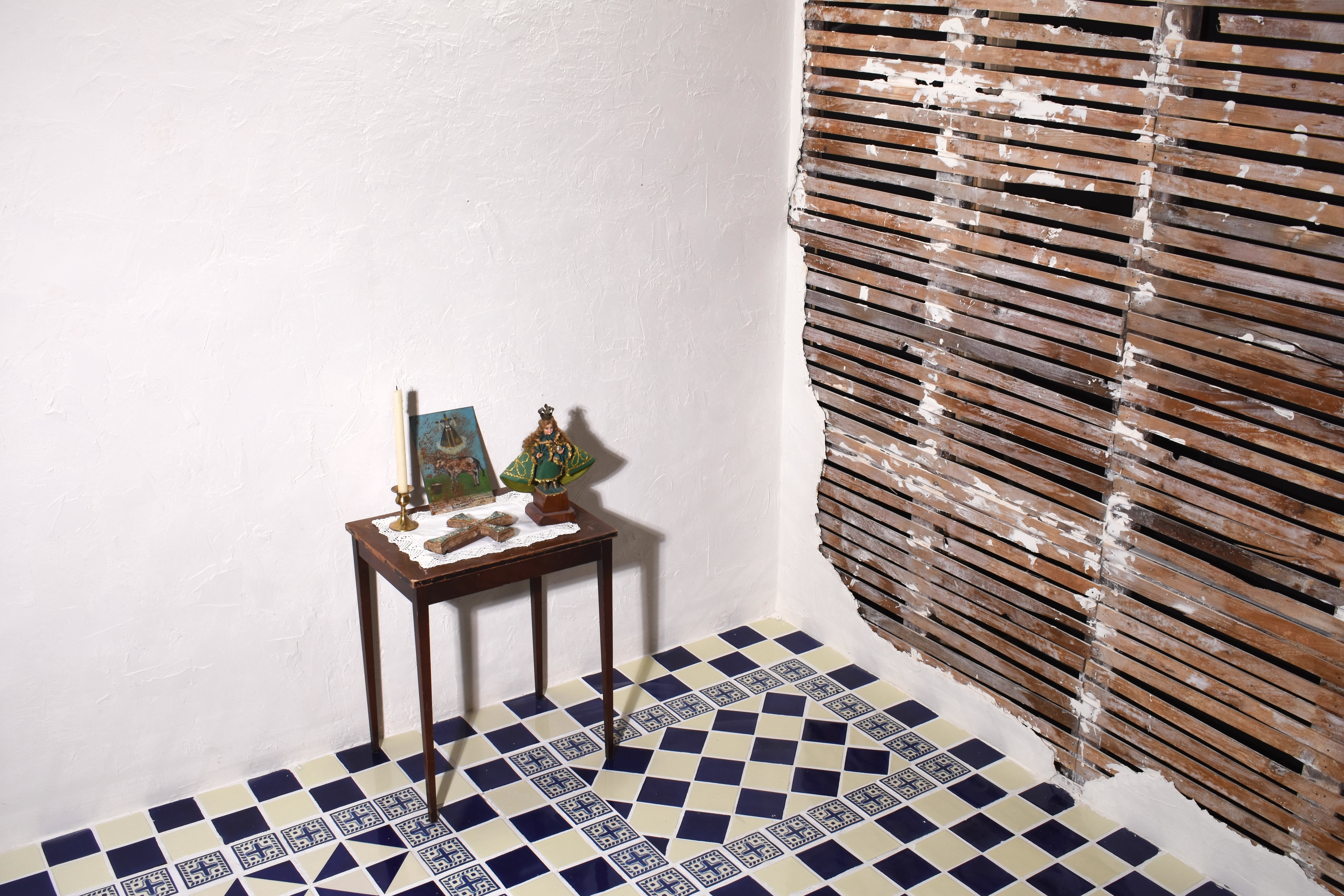 The Epistolary set: candle, altar, and Talavera-style tilework